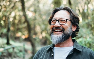 Man smiling outside
