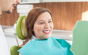 Woman smiling in the dental chair