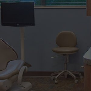 Chair and computer in dental exam room