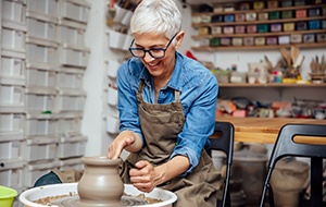 Woman smiling during ceramics class