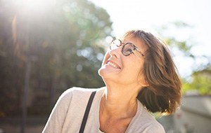 Lady smiles at the sky