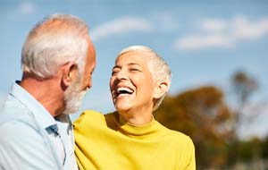 older couple smiling and laughing together