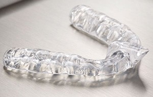 Clear nightguard for bruxism on metal tray