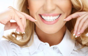 Are cosmetic defects spoiling your smile? You may qualify for porcelain veneers from Lincoln dentist, Dr. Louis Olberding. Learn the details here.