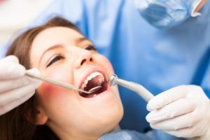 woman in dentist chair smiling