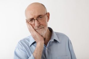 the dangers of getting dental implants for cheap