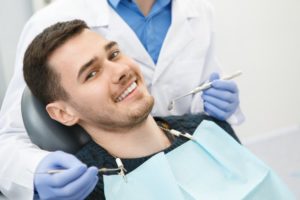 man visiting dentist in Lincoln