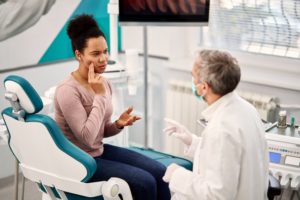 concerned patient talking to dentist